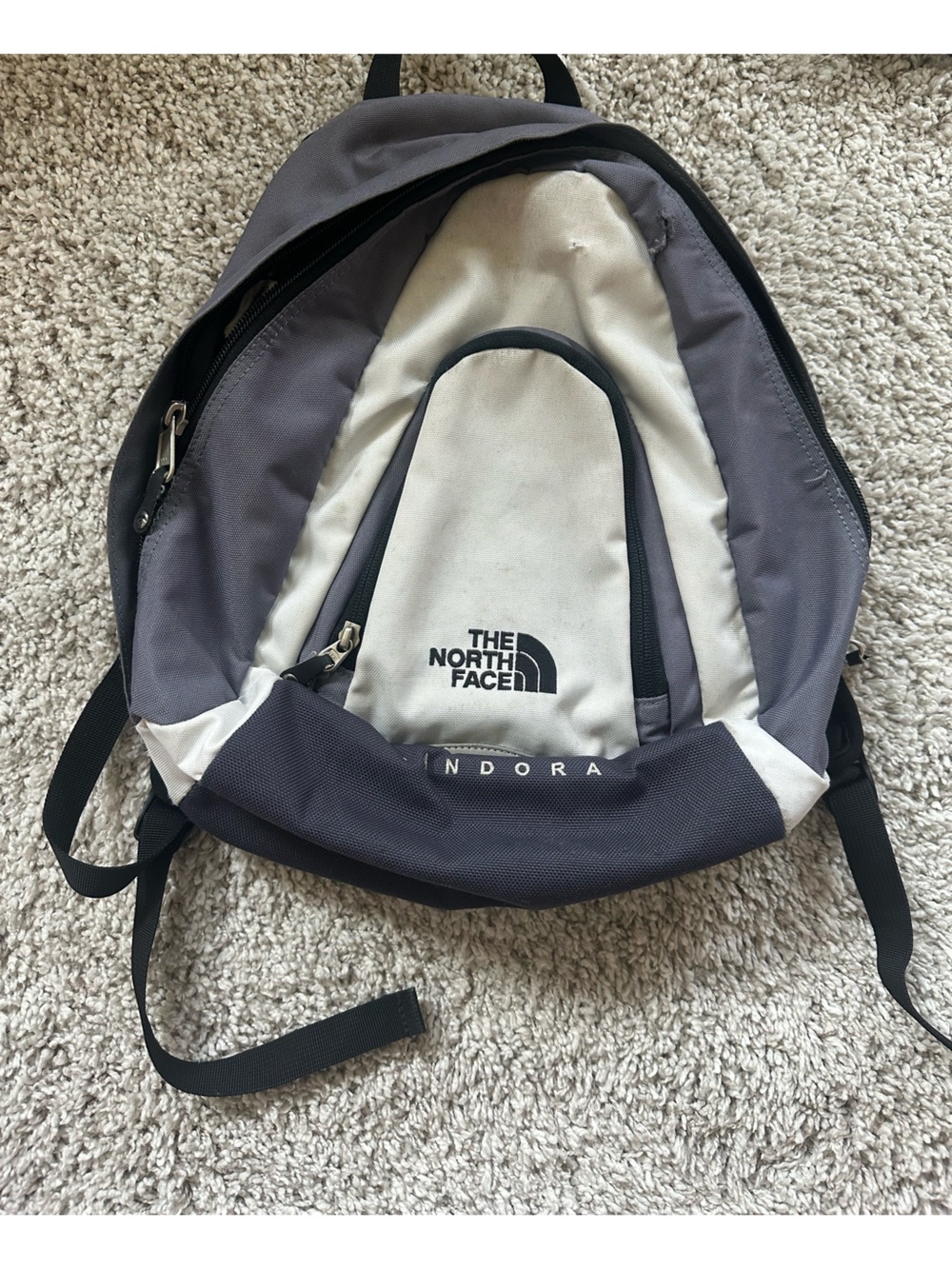 The North Face mini Sling backpack in Gray and White